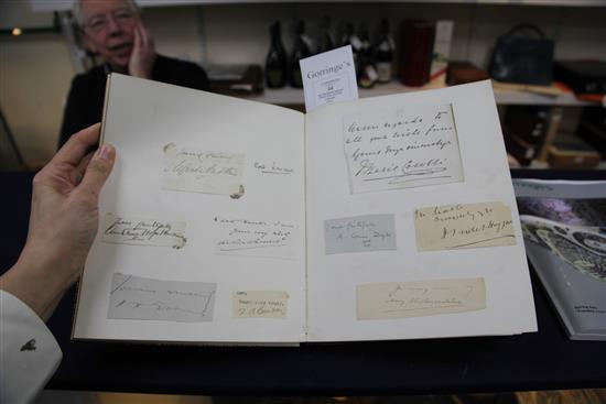 A 20th century autograph album, photo and a letter